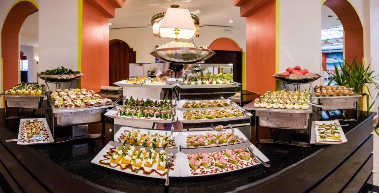 Pickalbatros Golf Beach Resort Sharm el-Sheikh Exterior photo A buffet at a hotel